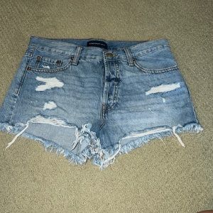 Distressed denim shorts